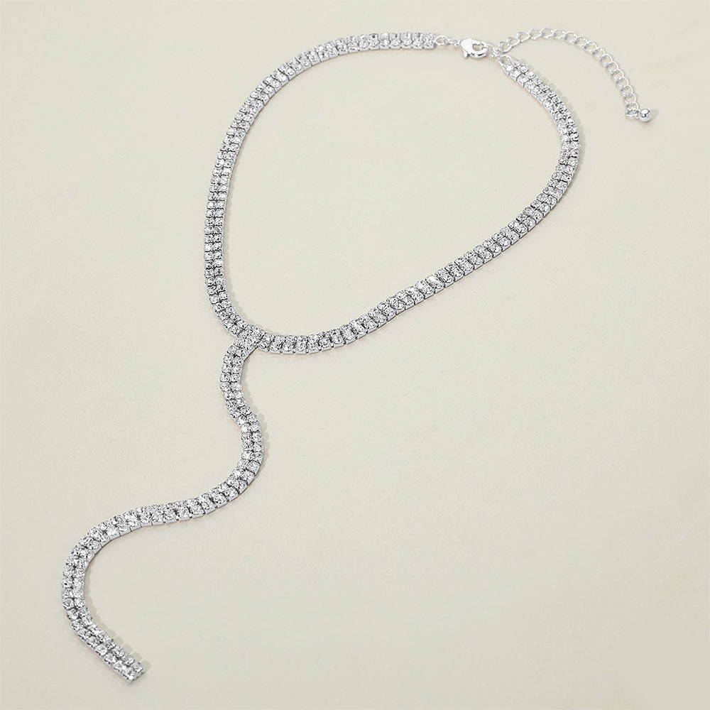 Silver rhinestone Y necklace with two strands and elegant drop for wedding or prom looks on a white background