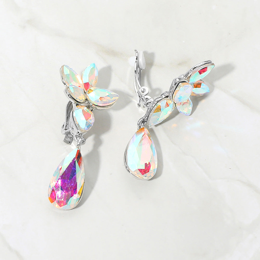 Slim AB crystal teardrop clip-on earrings on silver on white marble background
