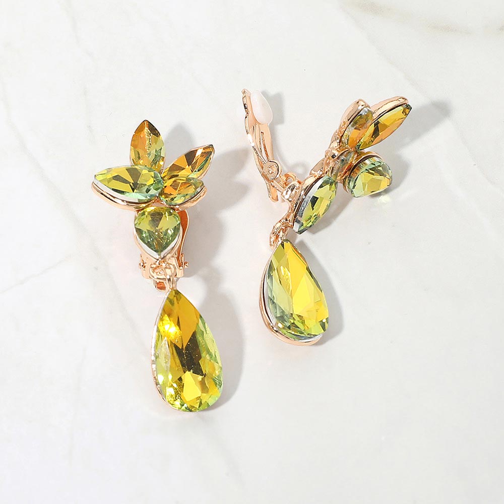 Slim Gold Stone-Light Topaz AB crystal teardrop clip-on earrings on gold on white marble background