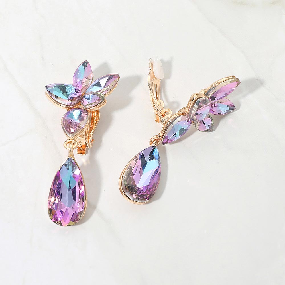 Slim Purple AB crystal teardrop clip-on earrings on gold on white marble background