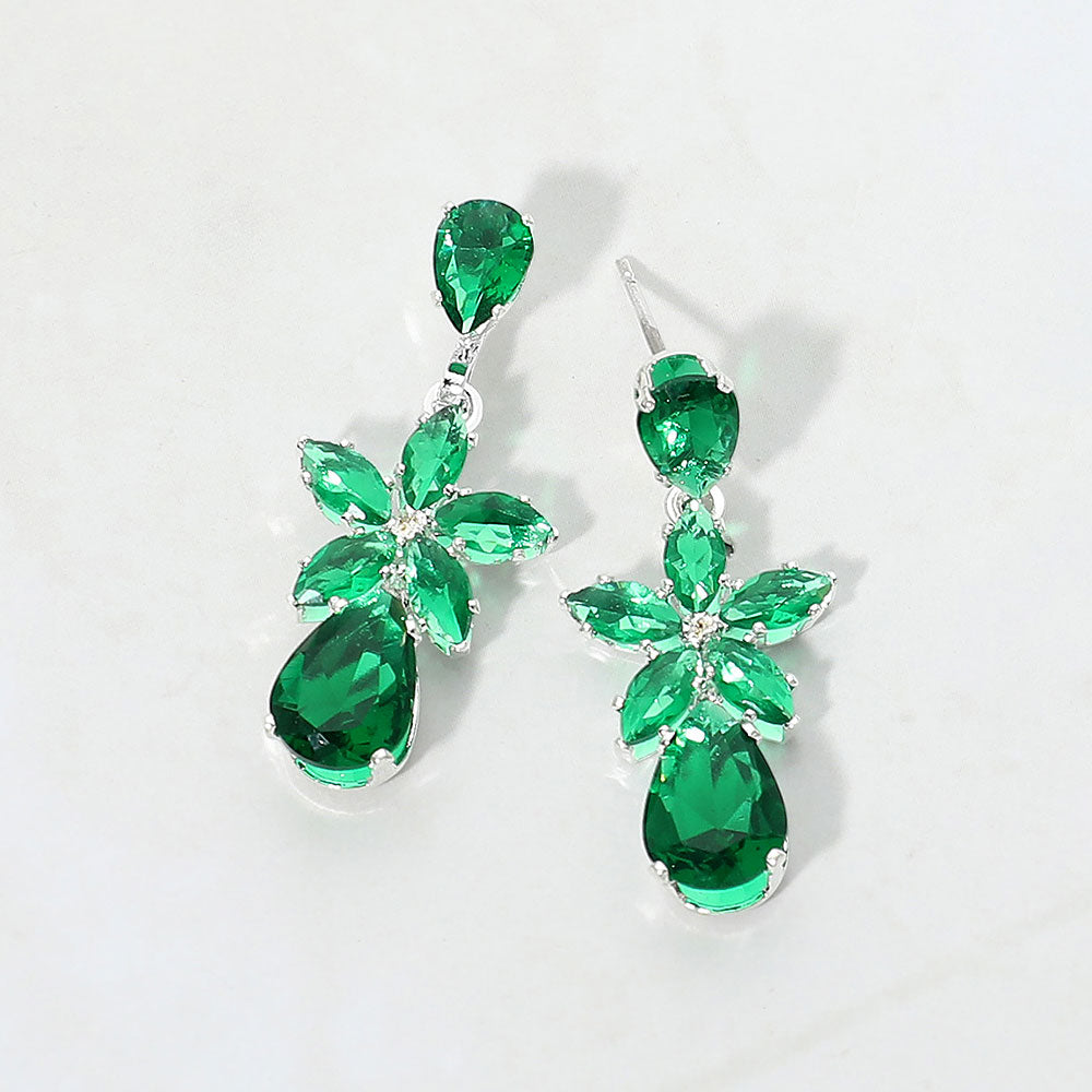 Small Emerald Green crystal floral teardrop pageant earrings for little girls on silver on white background