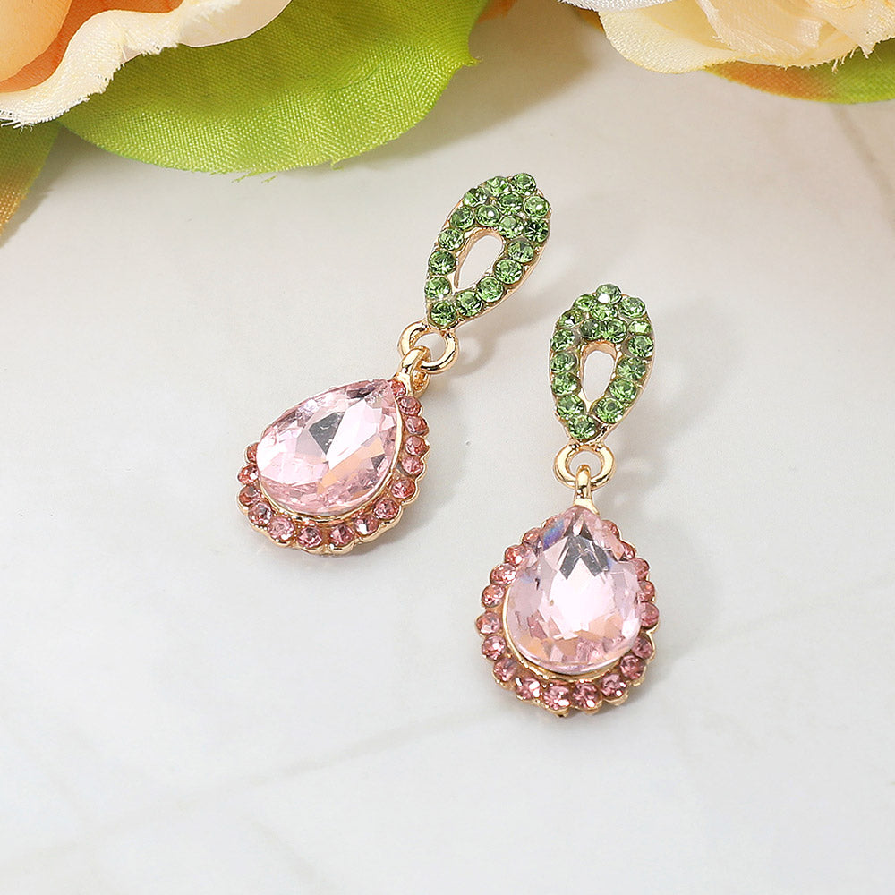 Pink and green crystal teardrop earrings with rhinestones backed in gold for interview or pageant on a white background