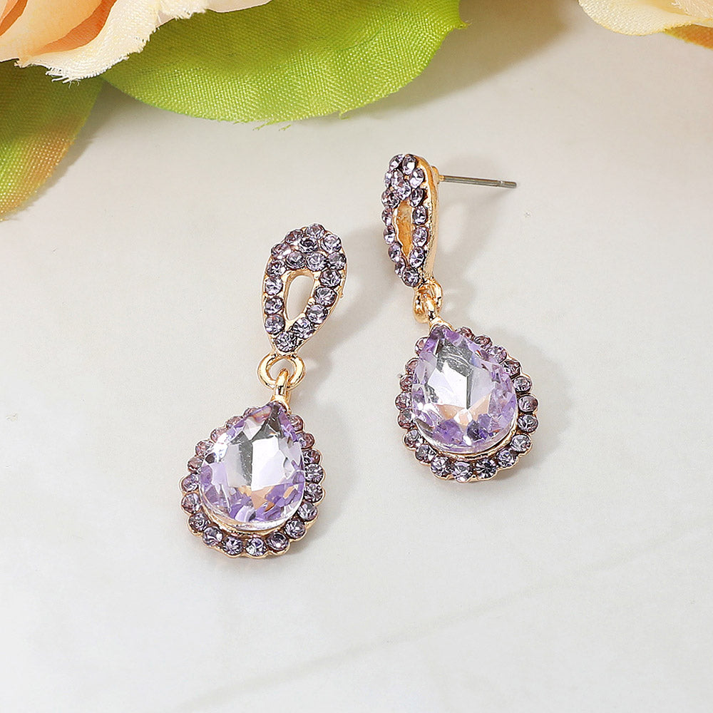 Lavender crystal teardrop earrings with rhinestone accents gold backed and on a white background for pastel formalwear or pageants