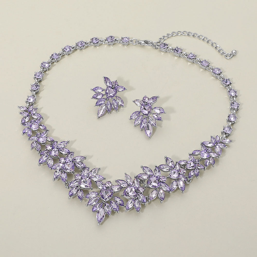 Violet purple lavender marquise floral statement necklace set on silver on a beige background