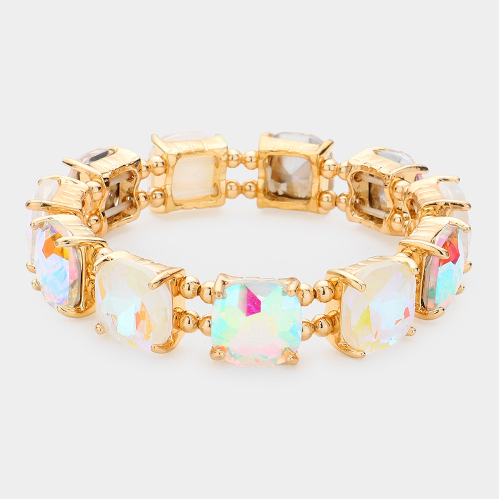 White and AB cushion square stone stretch evening bracelet on gold on white background