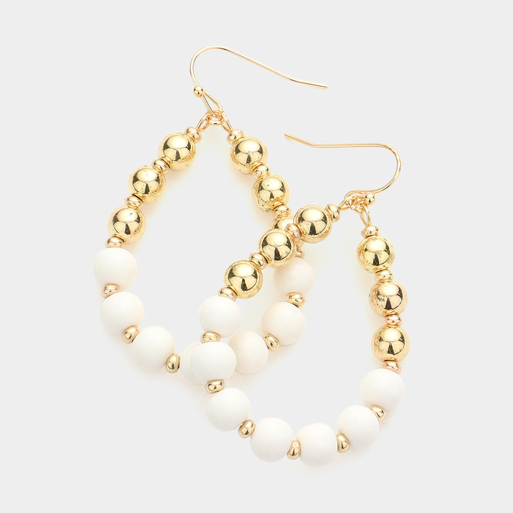 White & Gold Ball Teardrop Fun Fashion Earrings bold backed on a white background