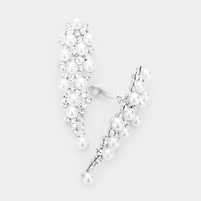 White pearl and crystal cluster bridal formal clip-on earrings on silver on white background