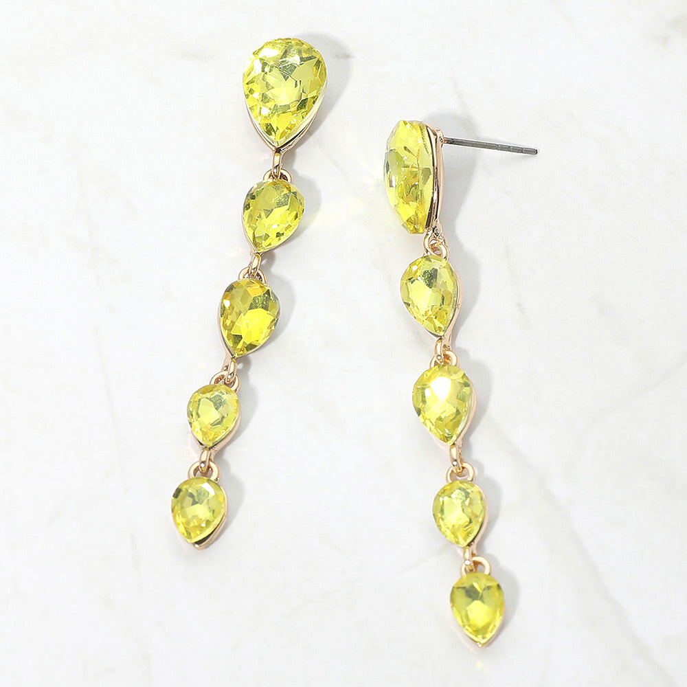 Pair of long yellow multi teardrop earrings on gold backing on a white background