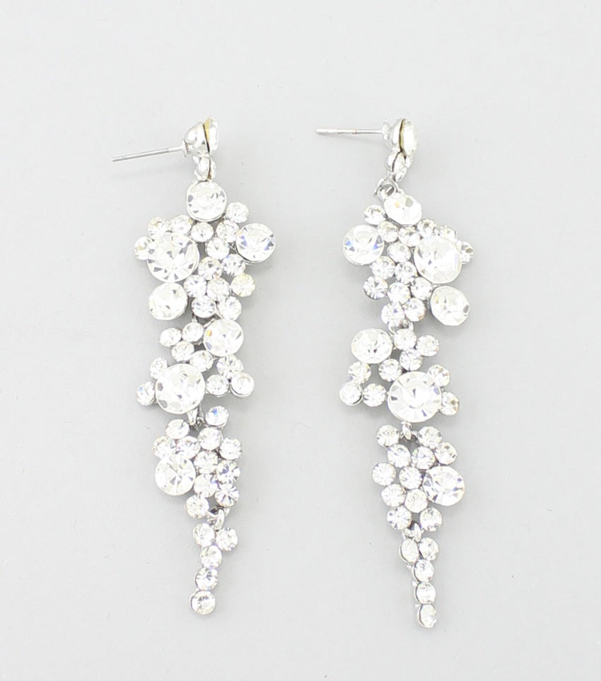 Crystal Long Dangle Earrings on silver. Shown here on a white background. 
