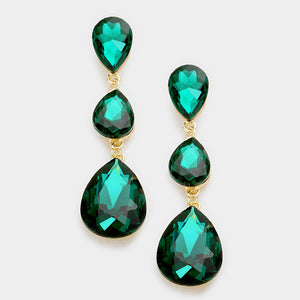 Emerald Triple Teardrop Earrings on gold on white background