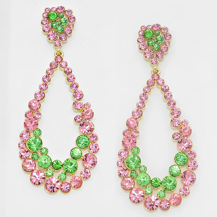 Big Pink Green Crystal Pagent Hoop Earrings with gold backing on a white background