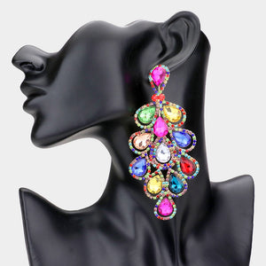 An extra-long ornate drop earring with cascading multi-color teardrop-shaped crystals and silver-tone metal detailing, displayed on a black mannequin head against a light gray background.