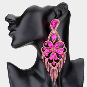 Very large fuchsia hot pink crystal flower fringe pageant earrings on gold with 5.5 inch drop shown on a black mannequin ear